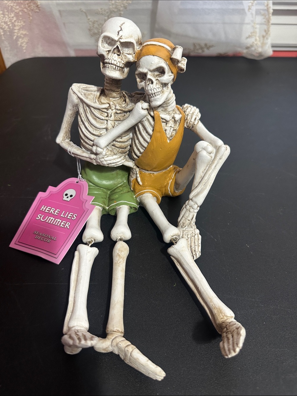 Summerween skeleton couple in swimwear decor